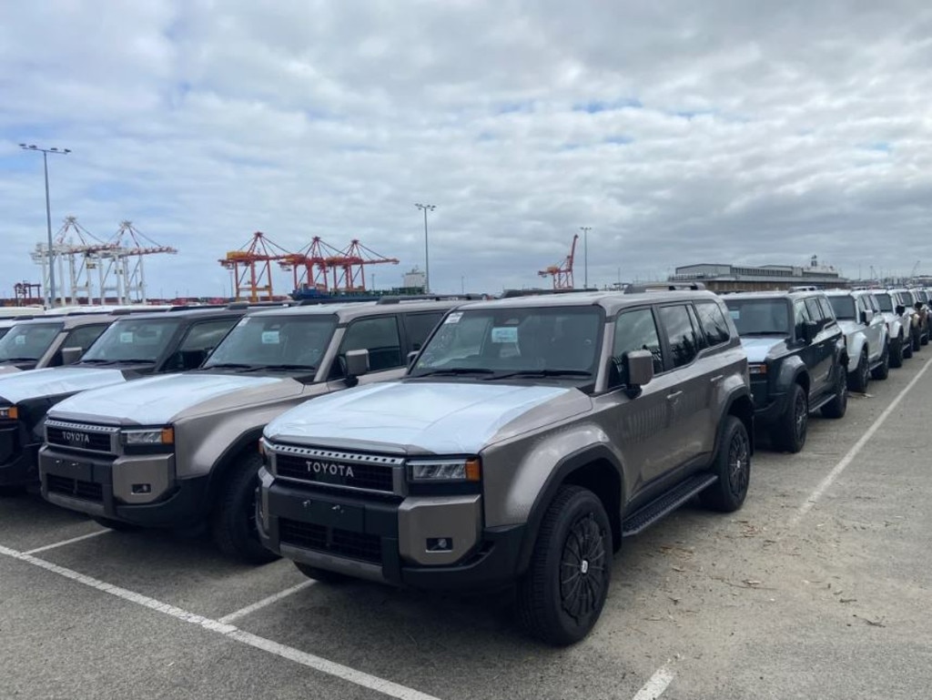 A photo of a new shipment of Toyota’s flashy new Prado models at Fremantle Port sparked a debate about cost of living. Picture: Reddit