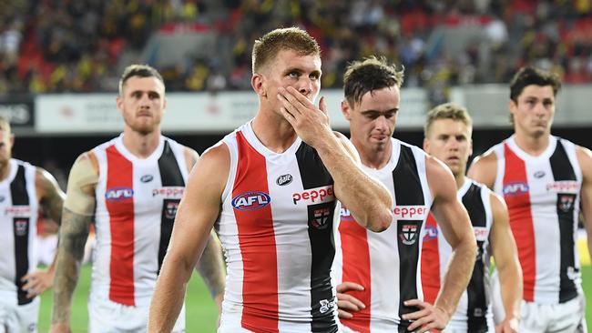 Sebastian Ross looks dejected after the Saints came up short by five goals.