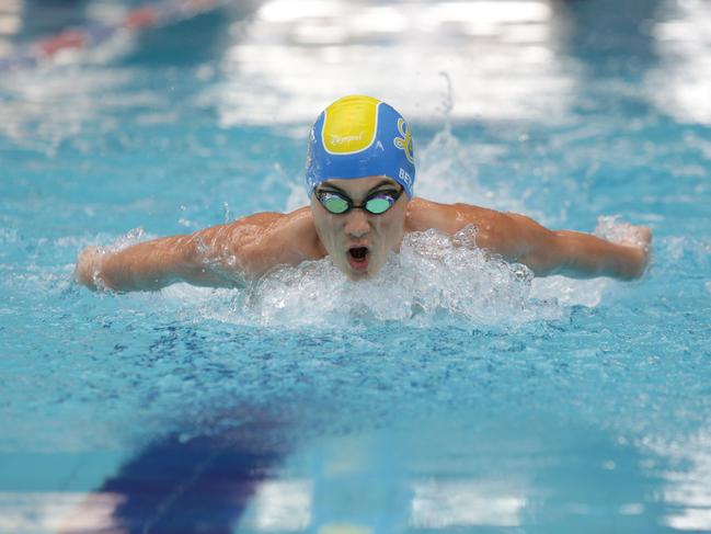 Ricky Betar ( Junior sports star ) training at Whitlam leisure centre pool.