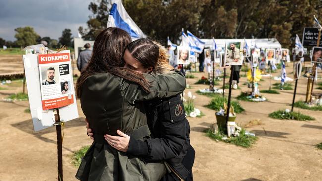 Mourners at the site of the Supernova music festival near Kibbutz Reimn in southern Israel. Picture: AFP