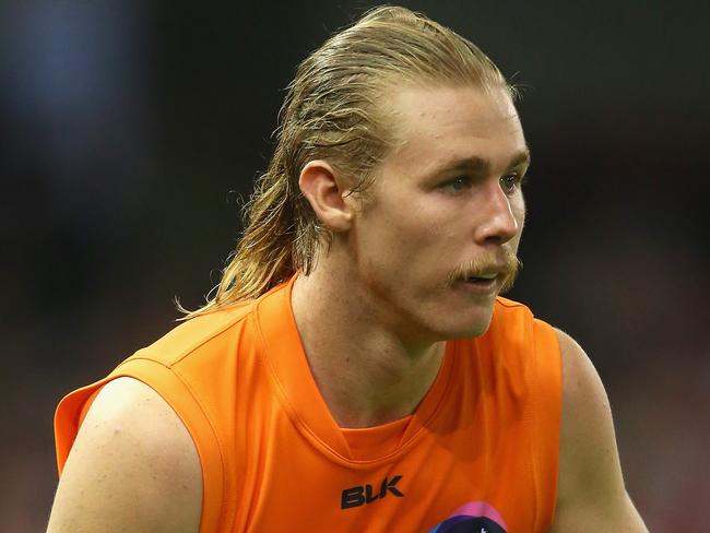 MELBOURNE, AUSTRALIA - APRIL 05: Cam McCarthy of the Giants kicks during the round one AFL match between the St Kilda Saints and the Greater Western Sydney Giants at Etihad Stadium on April 5, 2015 in Melbourne, Australia. (Photo by Quinn Rooney/Getty Images)