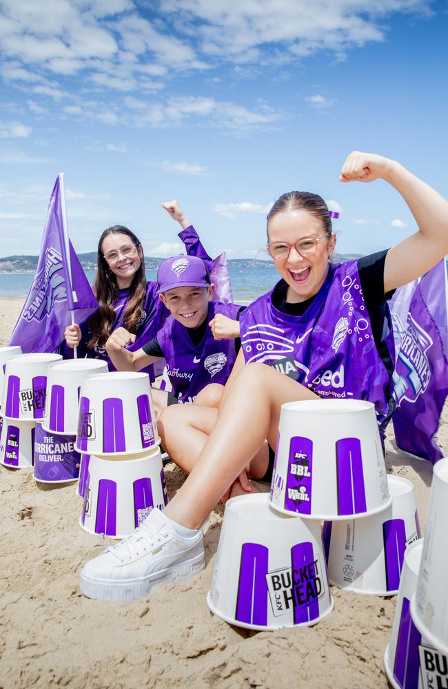 Hurricanes fans Bethany Scharvi, 12, Toby Scharvi, 10, and Georgia Sharvi, aged 14 are excited to watch the Hobart Hurricanes ahead of the BBL finals. Picture: Linda Higginson