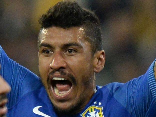 Alex Sandro Silva of Brazil (C) celebrates his teams second goal during the friendly international football match between Brazil and Australia in Melbourne on June 13, 2017. / AFP PHOTO / Mal Fairclough / IMAGE RESTRICTED TO EDITORIAL USE - STRICTLY NO COMMERCIAL USE