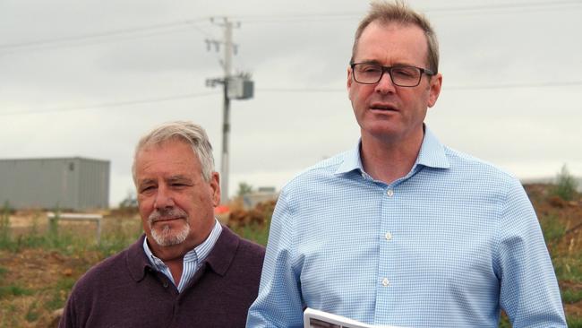 Ian Ritchie from Tasmanian Ground Screws and Infrastructure Minister Michael Ferguson during a press conference at Cambridge near Hobart on Monday February 10, 2020.