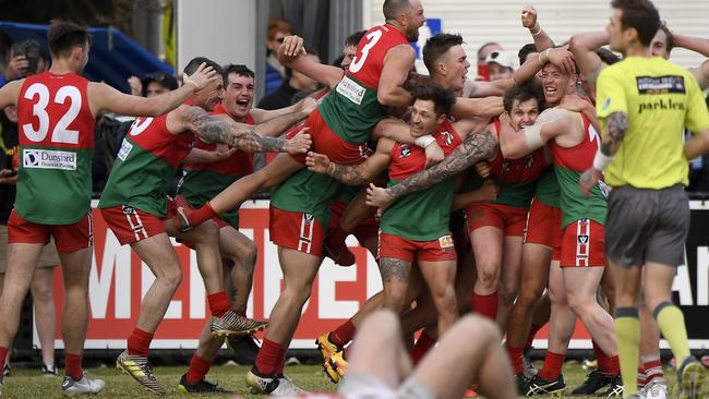 Pines celebrate after winning the 2018 MPNFL Division 1 grand final. Picture: Andy Brownbill)