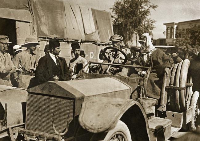 Lawrence of Arabia (right), with driver Lt-Col Walter Stirling, enters Damascus on October 1, 1918, in his Rolls-Royce. Picture: The Rolls-Royce Heritage Trust