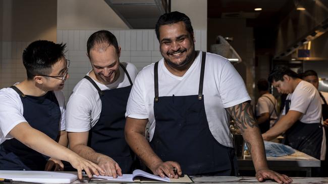 Min Jeong, Marzio Lamzini and Jay Rao write the final menu at Ruse Bar &amp; Brasserie before it opened on December 9. Picture: Monique Harmer