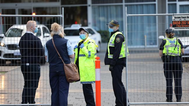 Police stand outside the Pullman Hotel in Adelaide. Picture: NCA NewsWire / David Mariuz