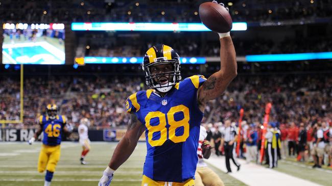 Lance Kendricks of the St. Louis Rams celebrates completing a reception for a 22 yard touchdown.