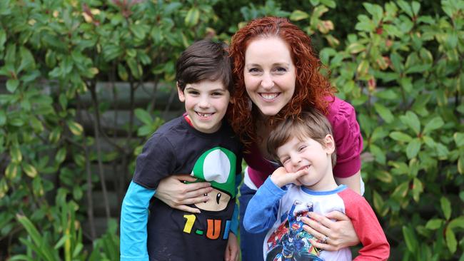 Mum Leanne Guglielmi, inventor of the Cozy Dozee, with sons Valentino and Orlando in 2014.