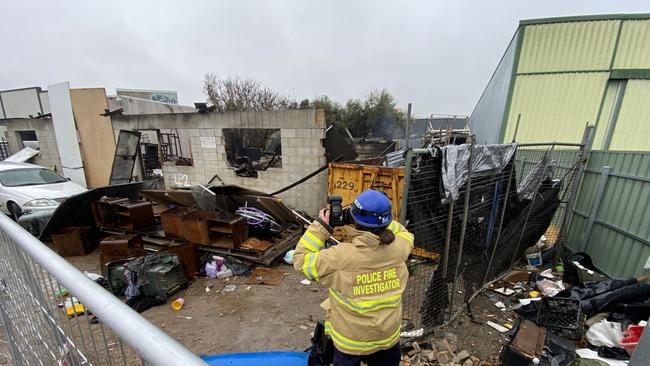 Fire Scene investigators at the scene of the factory fire. Picture: Roy Van Der Vegt