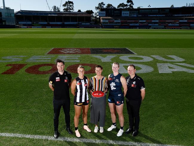 Magpies coach Sam Wright, Ruby Schleicher, Emma Moore, Breann Harrington and Blues coach Matthew Buck. Picture: Michael Willson/AFL Photos via Getty Images.