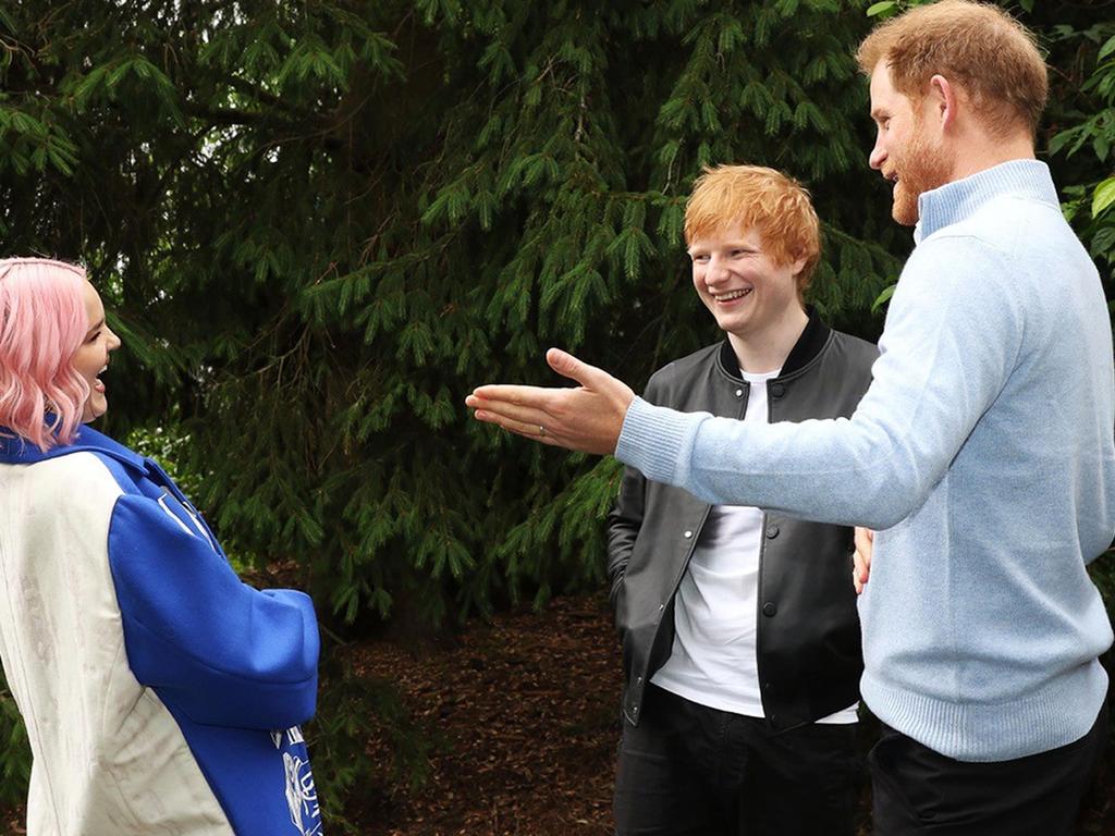 The Duke of Sussex speaking to Ed Sheeran and singer Anne-Marie during the WellChild Awards 2021 at a private garden party at Kew Gardens, in London.