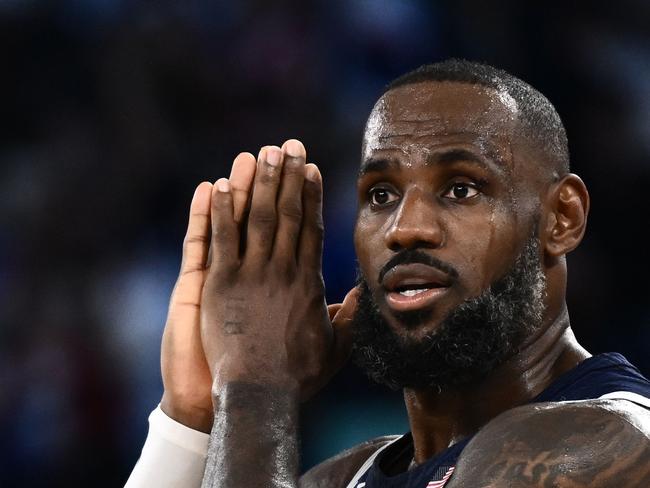 Good night... USA's LeBron James tells the crowd the game was over. Picture: AFP