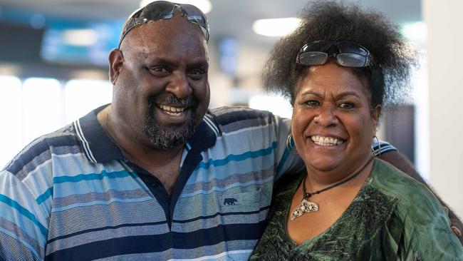 Darwin received its first arrivals from interstate as further border restrictions are lifted. Edward Tapim and Daphne Tapim from Townsville, QLD were excited to be back together after four months apart. Picture: Che Chorley