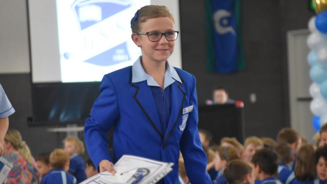 Year six students being recognised and celebrated at their school graduation ceremony.