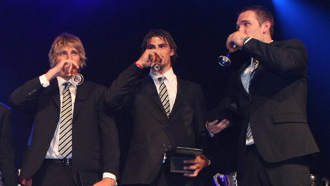 Dale Thomas, Scott Pendlebury and Dane Swan in 2010.