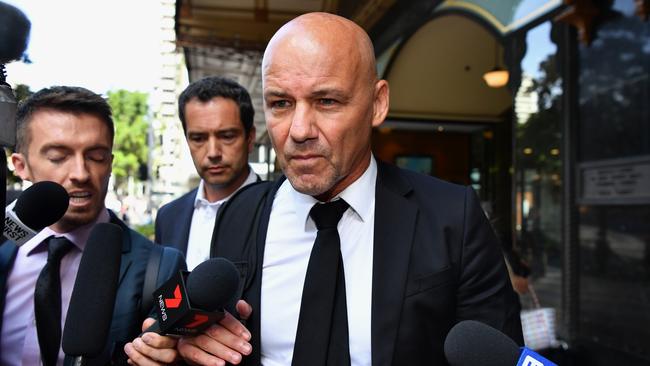 Gary Jubelin leaves Downing Centre Local Court in Sydney. Picture: AAP