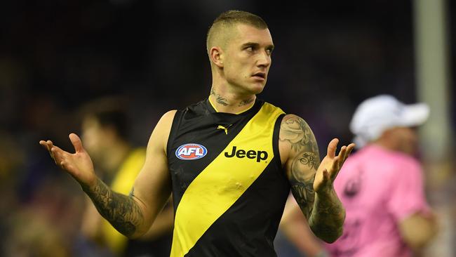 Dustin Martin may soon be fielding an offer from Essendon. Photo: AP Image/Julian Smith