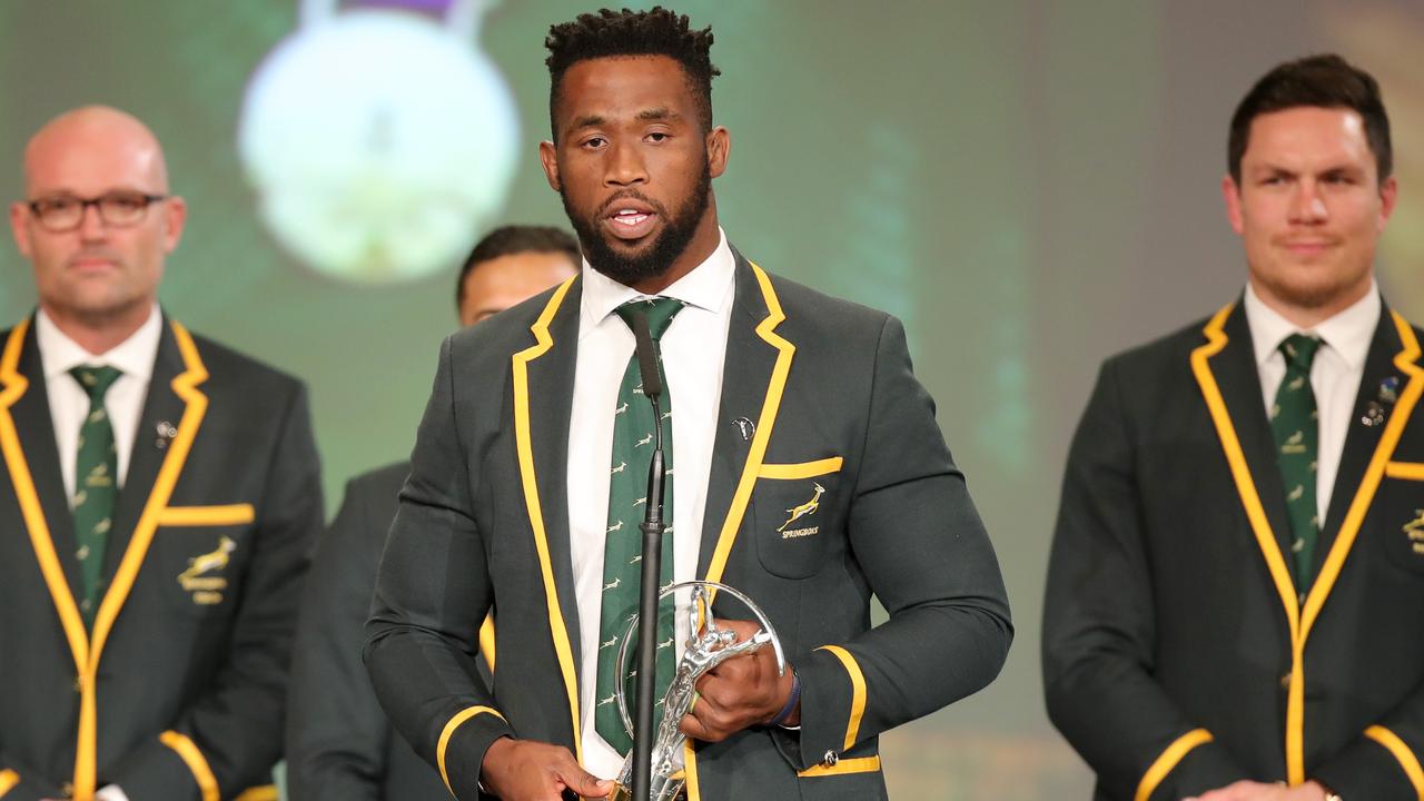 Siya Kolisi accepts the Laureus World Team of the Year award in Berlin.