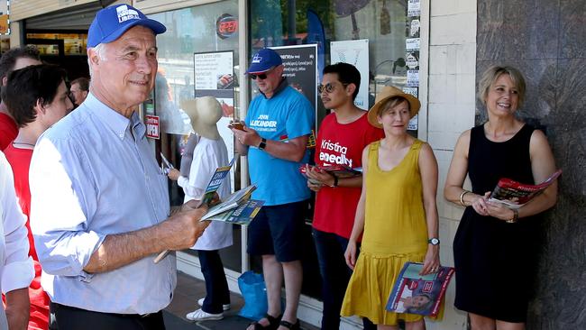 Politicians hit the campaign trail in the federal seat of Bennelong ahead of the by-election vote this Saturday. Liberal member John Alexander and Labor member Kristina Keneally hand out flyers outside the pre polling office in Epping, John was joined by Federal Treasurer Scott Morrison. Picture: Toby Zerna