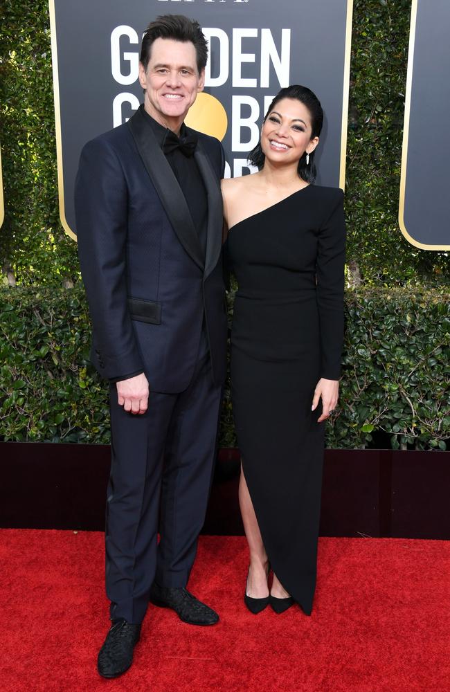 Jim Carrey and Ginger Gonzaga. Photo: Jon Kopaloff/Getty Images/AFP