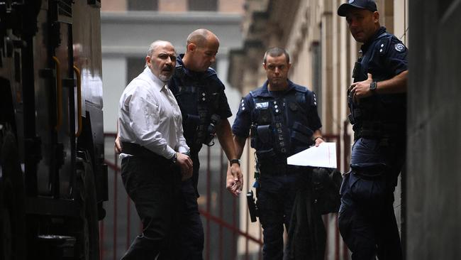 Tony Mokbel (left) arrives at the Supreme Court of Victoria in Melbourne, Monday, November 25, 2024. (AAP Image/Joel Carrett) NO ARCHIVING