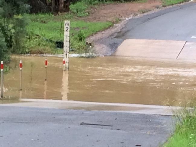 The flooded causeway at Rouse Rd.