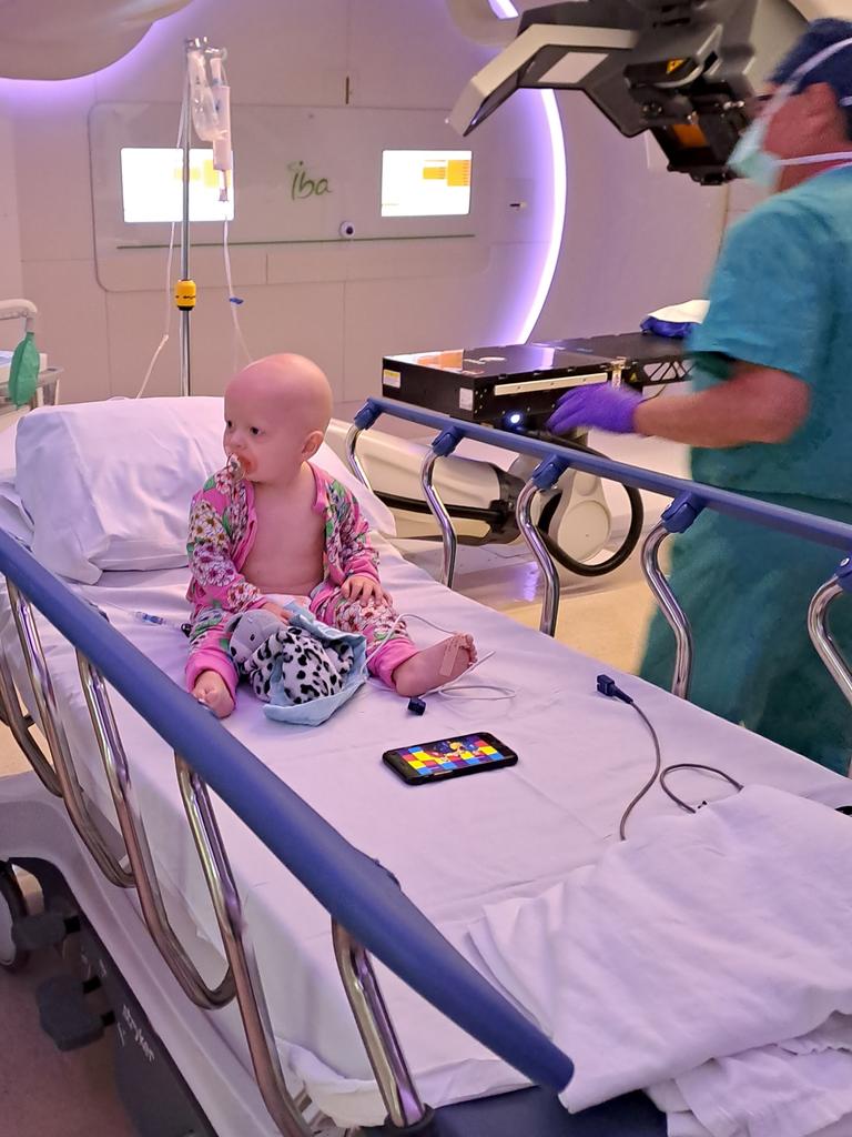 The little girl spent months in the US undergoing proton therapy …