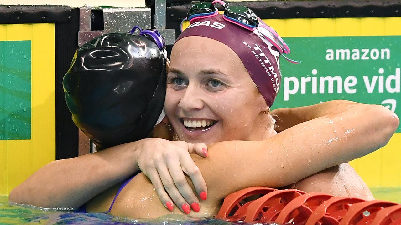 Titmus hugs Emma McKeon after winning the women's 200m freestyle final. Picture: Getty Images