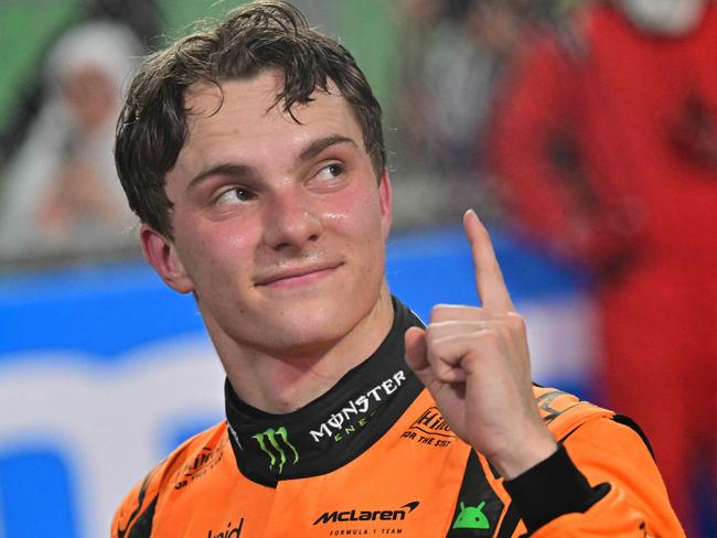 McLaren's Australian driver Oscar Piastri celebrates winning the 2025 Saudi Arabia Formula One Grand Prix at the Jeddah Corniche Circuit on April 20, 2025. (Photo by Giuseppe CACACE / AFP)
