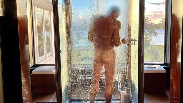 Greg Norman enjoys his final shower in his Florida mansion