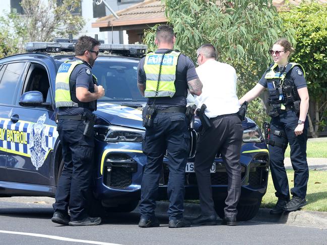 Police at the scene of a house fire in Princess Street, Corio on Monday. Picture: Alan Barber