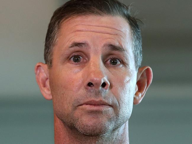 ARL Commissioner Mark Coyne speaks to the media at Qantas domestic terminal in Sydney after arriving home from Singapore where he was arrested by local police after an expletive laden rant during a drunken night out. Picture: Toby Zerna