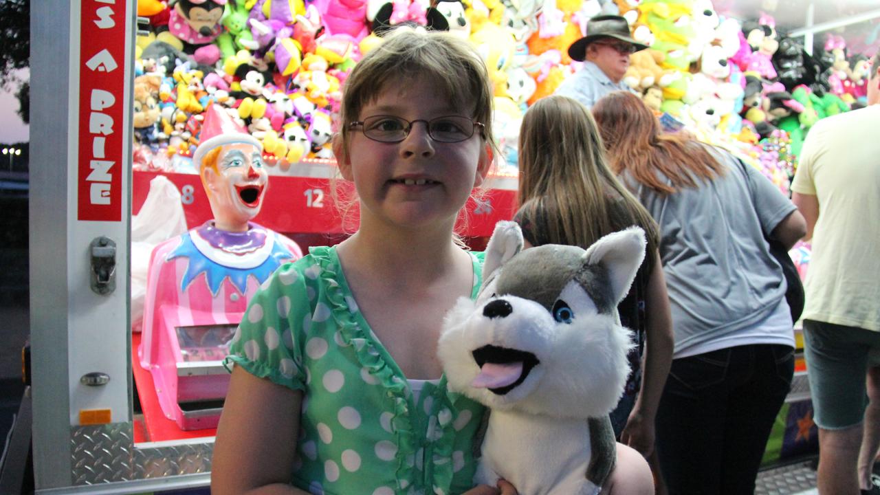 <p>Georgia Osborne scored a new pet at the Mardi Gras on Friday night. Photo: Erin Smith / Warwick Daily News</p>