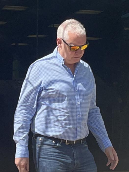 Supercars head of motorsport Adrian Burgess leaving the Southport courthouse after pleading guilty to driving under the influence of liquor. Picture: Jessica Paul