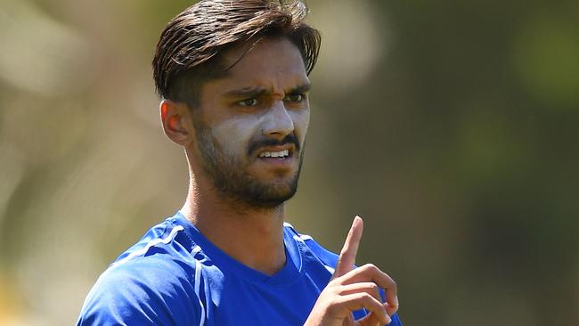 MELBOURNE, AUSTRALIA - MARCH 02: Aaron Hall of the Kangaroos warms up during the 2019 JLT Community Series AFL match between the North Melbourne Kangaroos and the St Kilda Saints at Avalon Airport Oval on March 02, 2019 in Melbourne, Australia. (Photo by Quinn Rooney/Getty Images)