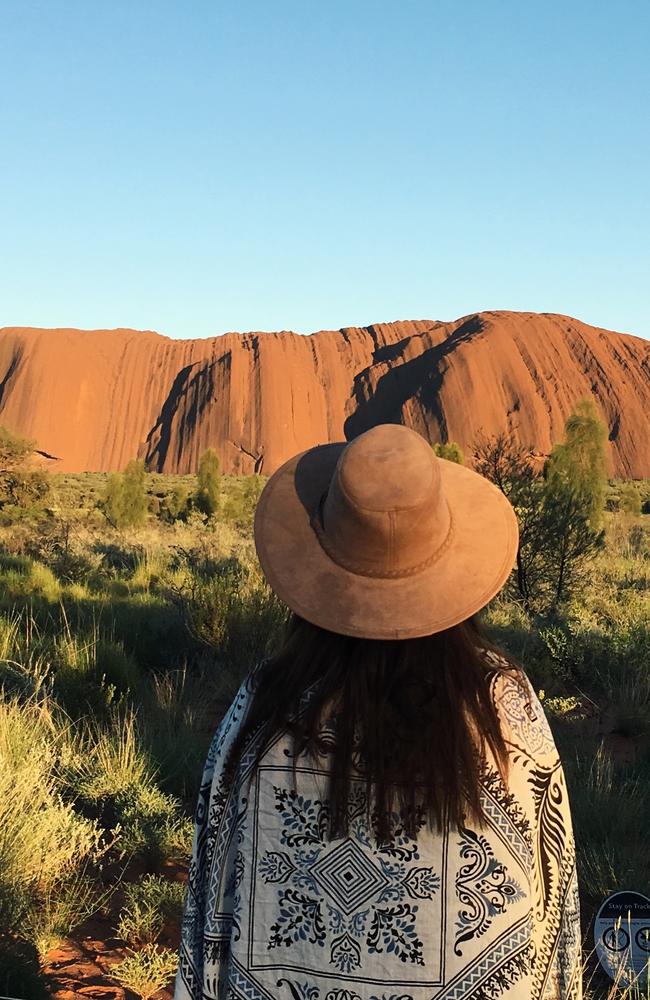 Gold Coast Bulletin journalist Emily Selleck at Uluru just after sunrise. Picture: Supplied