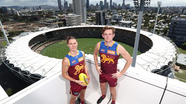 The AFL Brisbane Lions and Queensland Cricket have issued a joint plea for a new Olympic stadium. Brisbane Lions Eric Hipwood and Harris Andrews. Picture: Peter Wallis