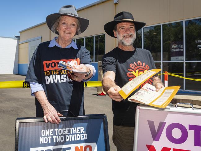 Jan Gorbacz for the No campaign and Rob Cox for the Yes campaign hand out how-to-vote cards prepoll at the Groom AEC Neil St polling place in the 2023 Australian Indigenous Voice referendum, Monday, October 9, 2023. Picture: Kevin Farmer