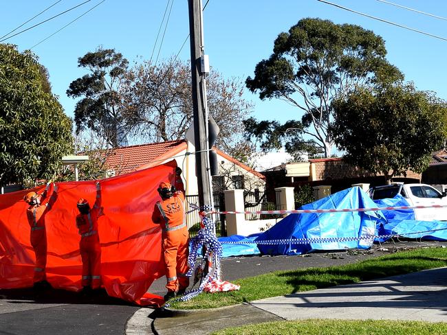 SES have tarped the area to block the view of the crash scene. Picture: Nicole Garmston