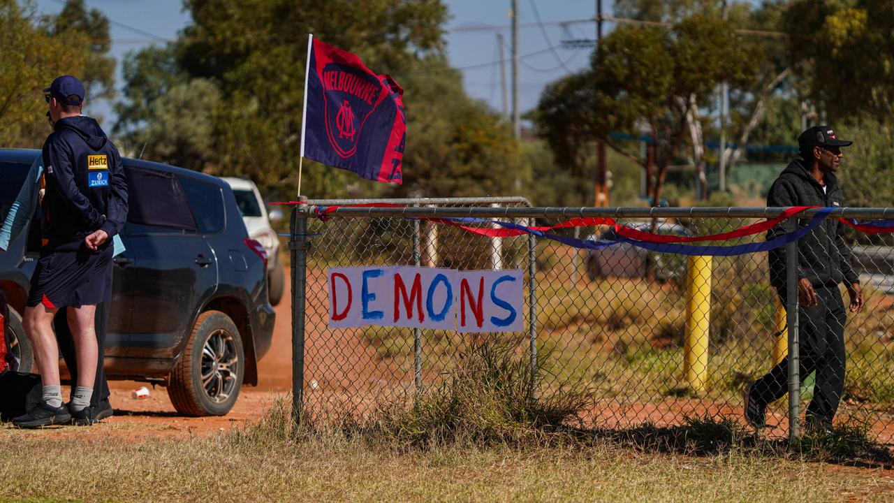 Melbourne Demons players Shane McAdam and Andy Moniz-Wakefield went to Santa Teresa ahead of the 2025 AFL game in Alice Springs. Picture: Melbourne Demons