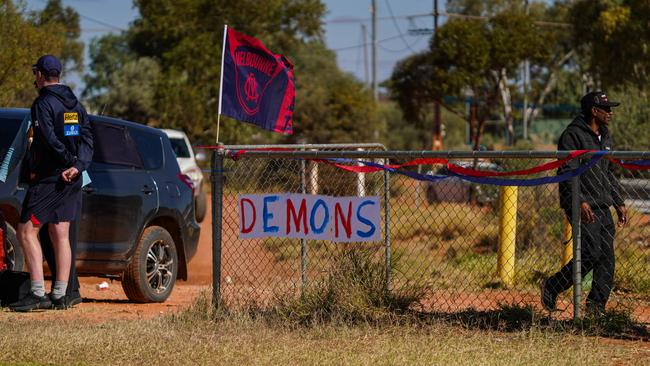 Melbourne Demons players Shane McAdam and Andy Moniz-Wakefield went to Santa Teresa ahead of the 2025 AFL game in Alice Springs. Picture: Melbourne Demons