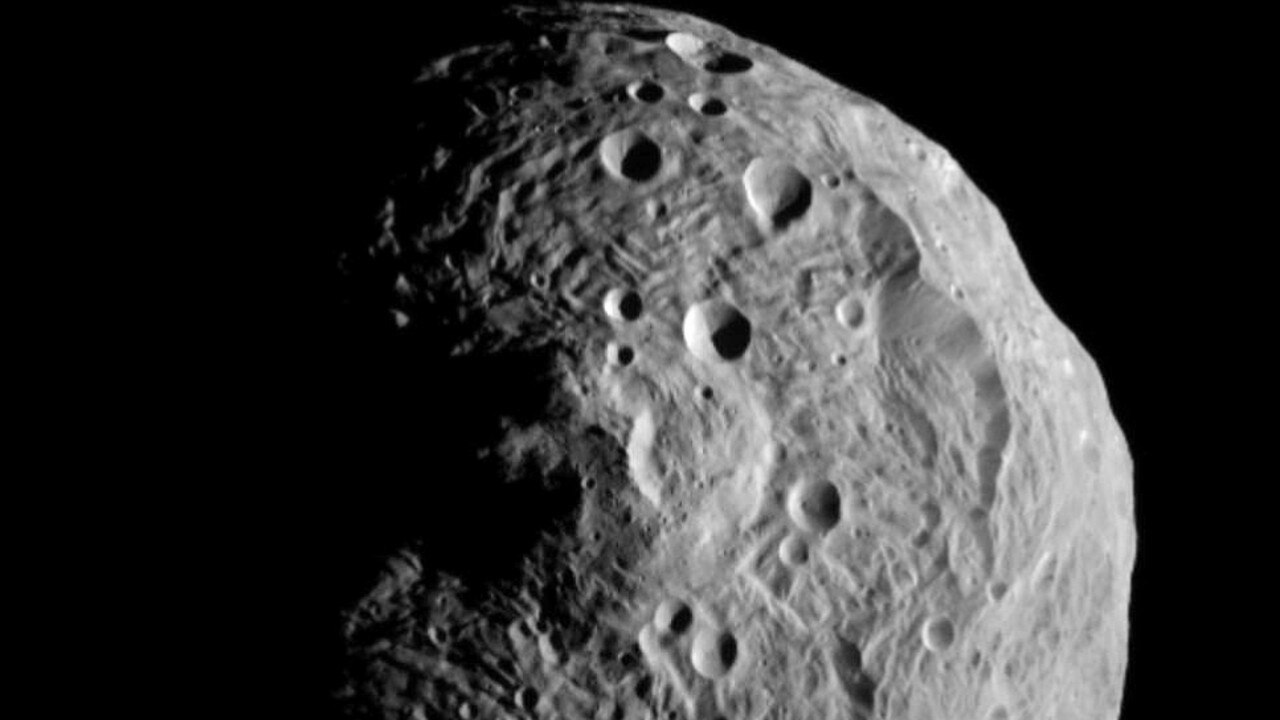 The asteroid Vesta, photographed by the Dawn spacecraft on July 17, 2011. Picture: AP Photo/NASA/JPL