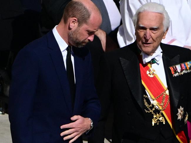 Prince William went for a traditional mourning suit. Picture: AFP