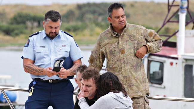 A suspected Australian family of the victims returning from giving blessing to the military personal who will be commencing the operation to retrieve the bodies off White Island on 13th of December 2019. Picture: Adam Yip