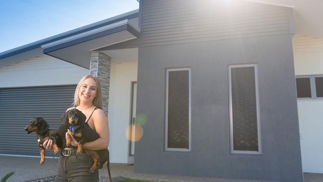 Kate Johnson, 21, was a beneficiary of the NT government’s Build Bonus program, building her first home in Zuccoli last year. Picture: Che Chorley