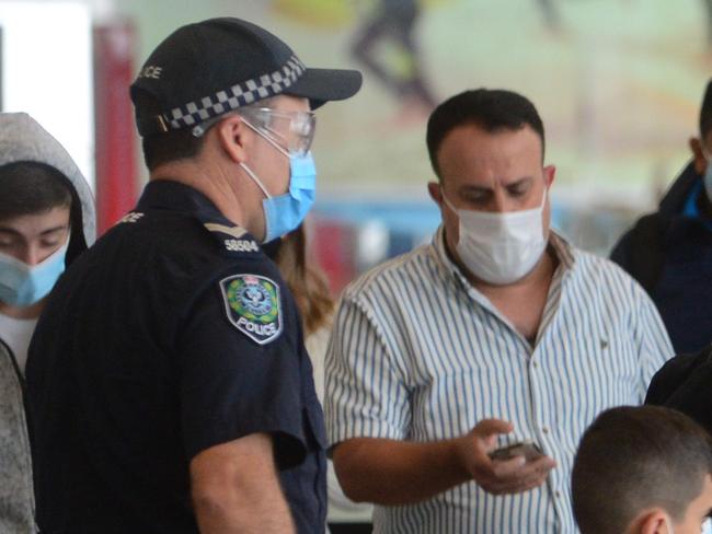 Adelaide Airport, Monday 21 December, 2020. Passengers on flight VA412  from Sydney to Adelaide enter the Adelaide Airport Terminal and were ushered into an area for processing. Photo Sam Wundke.