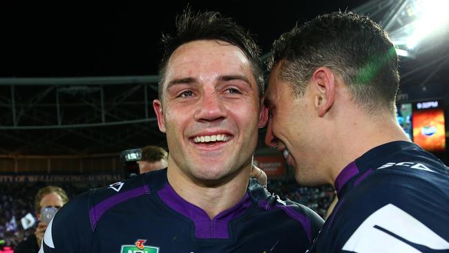 Cooper Cronk and Billy Slater celebrate winning the 2017 NRL Grand Final. Pic: Adam Head