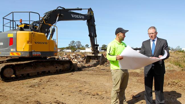 Urban Infrastructure Minister Paul Fletcher (right) and demolition contractor Michael Antoun at the site of the future Badgerys Creek airport in August. Picture: Hollie Adams/The Australian